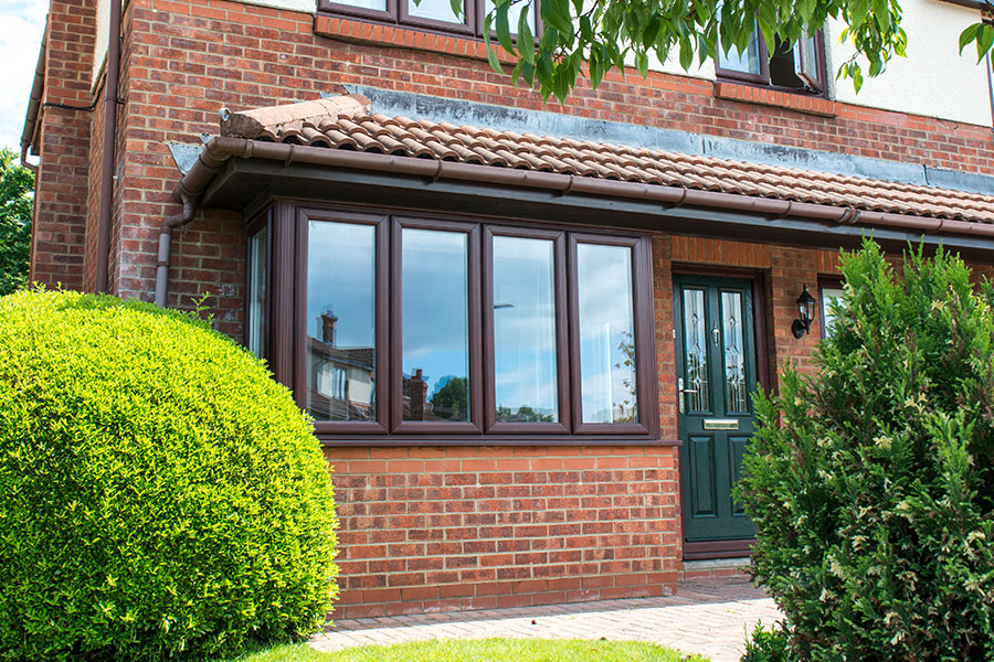 Mahogany UPVC Bay Window with Brick Exterior